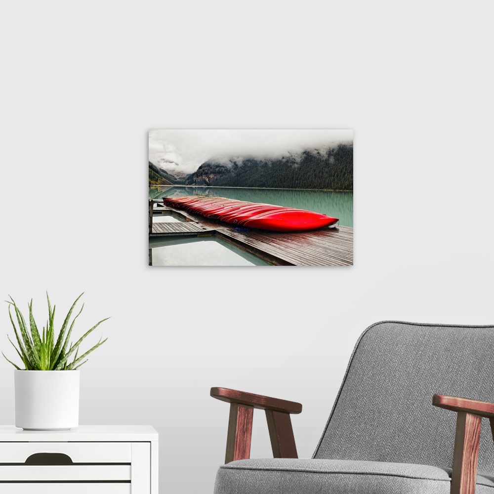 A modern room featuring Low Angle View of a Dock with Red Boats, Lake Louise, Alberta, Canada
