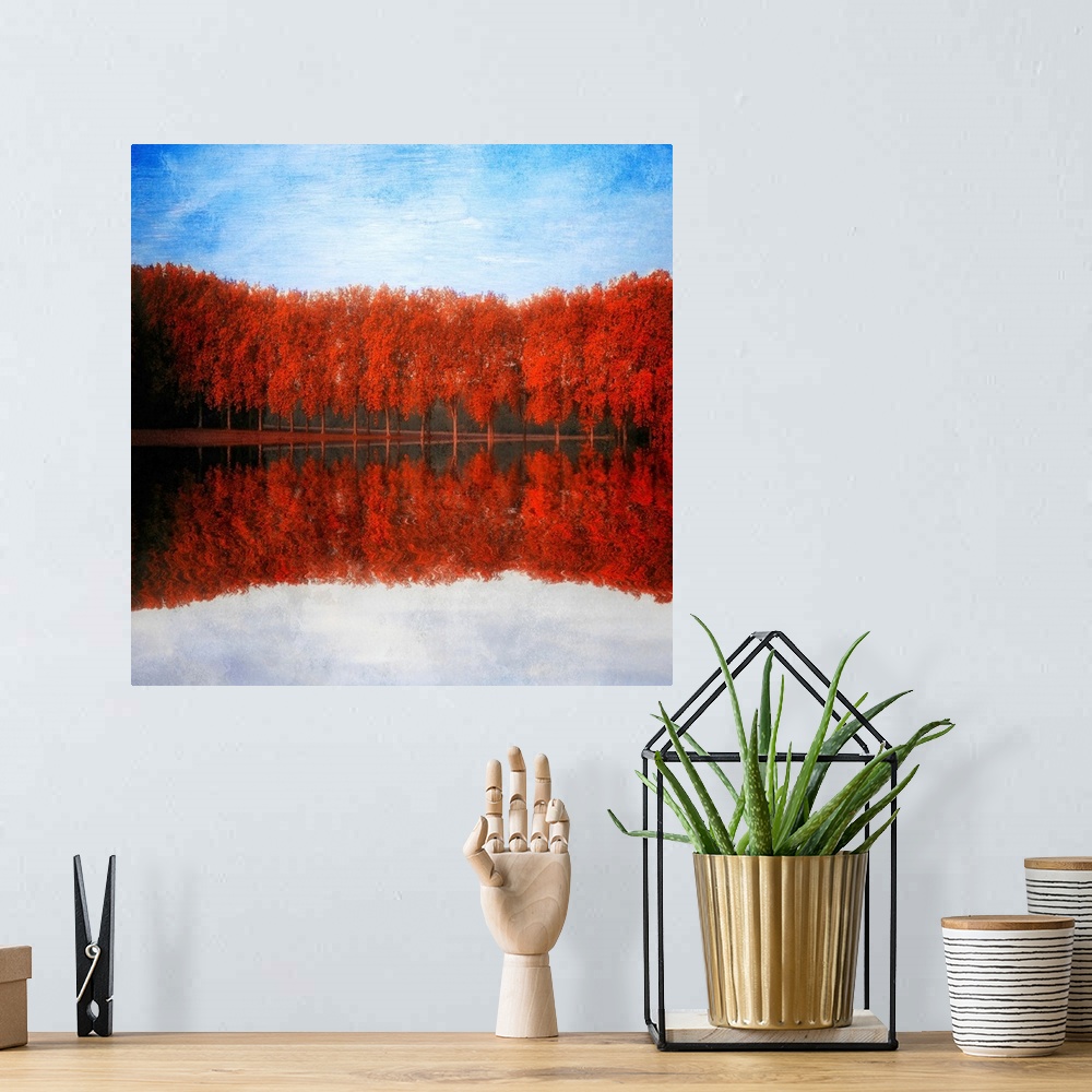 A bohemian room featuring Reflections of red trees by a lake