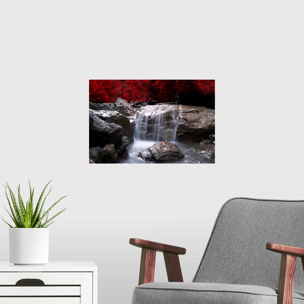 A modern room featuring A waterfall in front of a red autumn forest