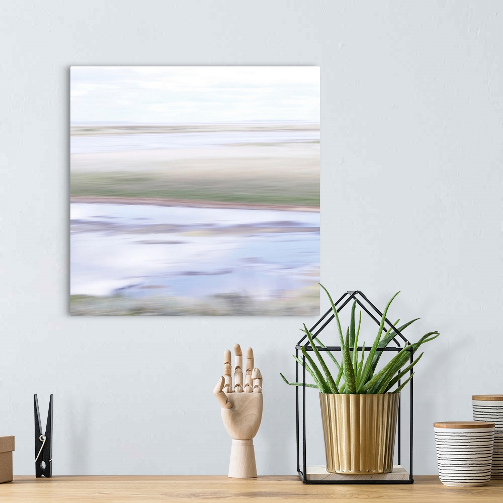 A bohemian room featuring Artistically blurred photo. A quiet summer afternoon, the water reflects the stillness.
