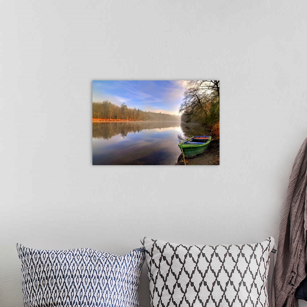 A bohemian room featuring Quite lake in the Broceliande forest with a colored boat on the side in France, Broceliande fores...