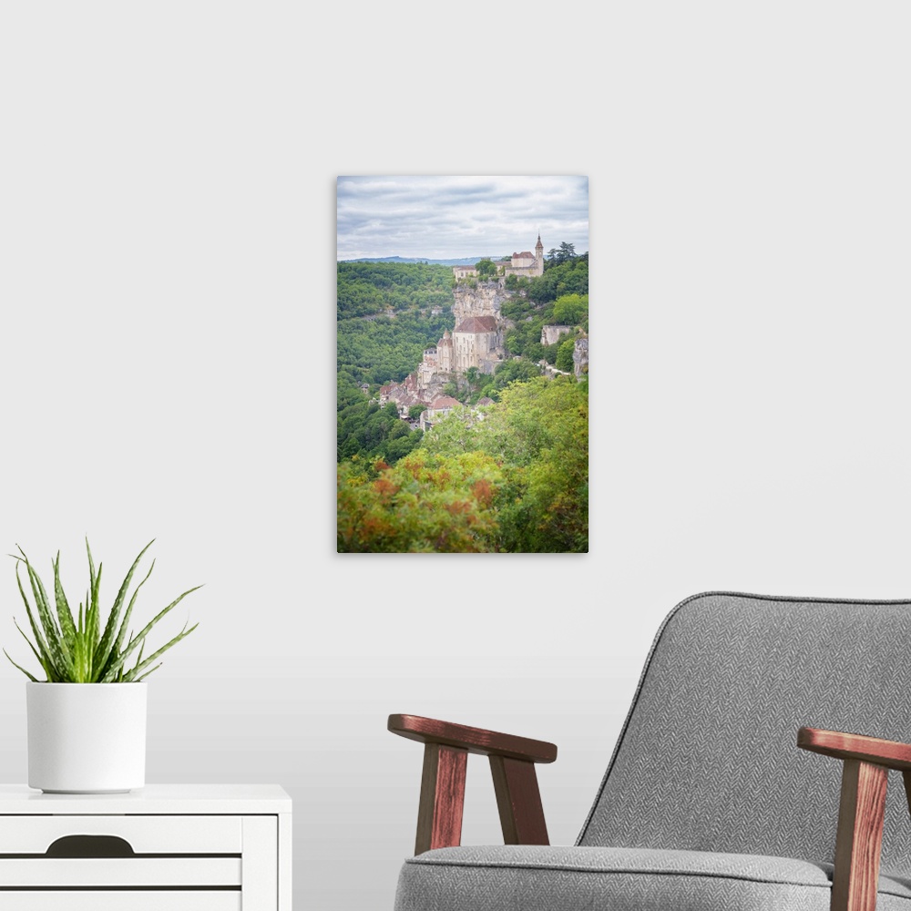 A modern room featuring Verical view of Rocamadour old medieval village in the south of France, occitanue area, among tre...