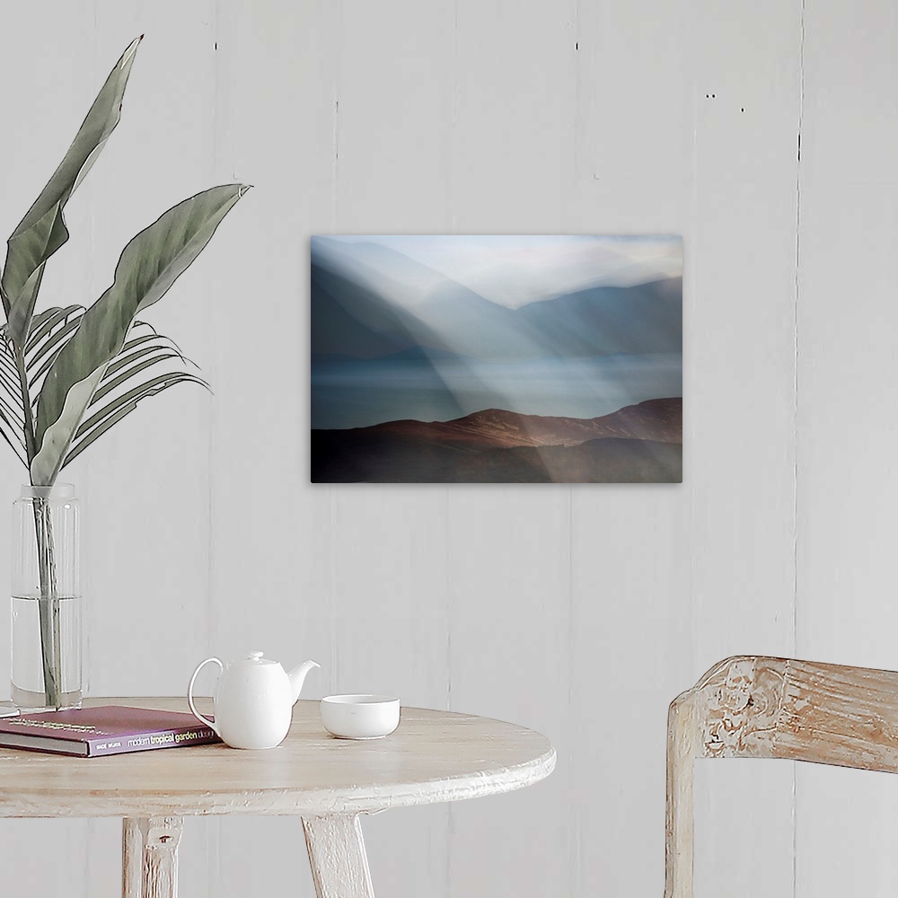 A farmhouse room featuring Dreamy landscape photograph of Loch Morlich in Scotland with rolling hills in the background and ...