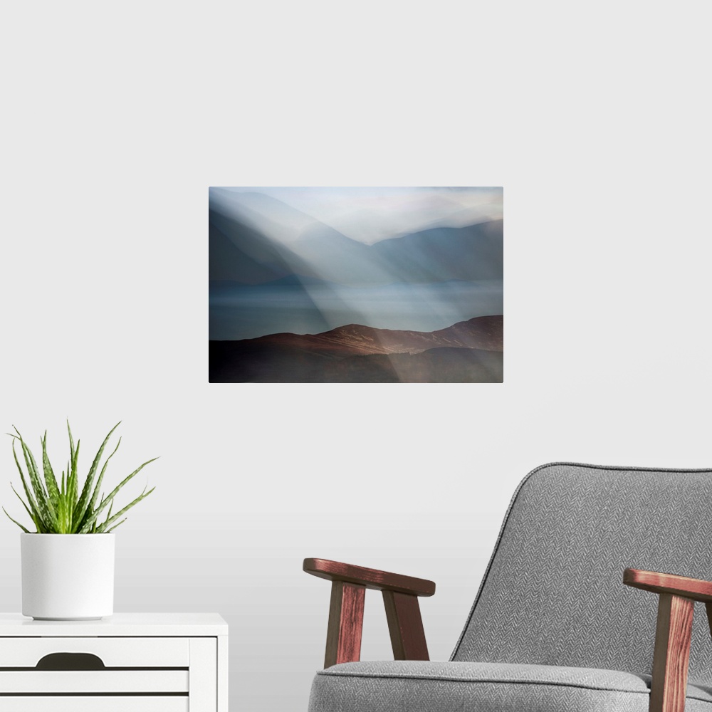 A modern room featuring Dreamy landscape photograph of Loch Morlich in Scotland with rolling hills in the background and ...