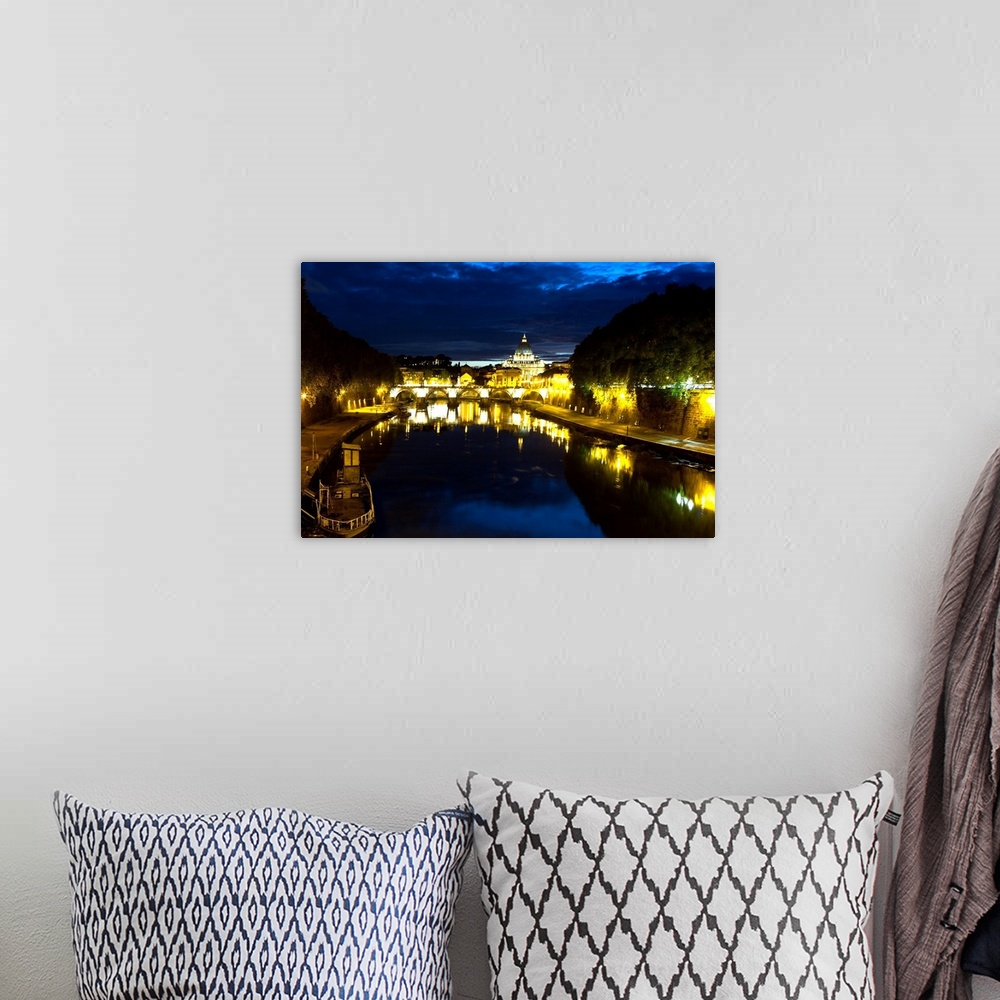 A bohemian room featuring Night view of the Tiber River with the Vatican City in the Background, Rome, Lazio, Italy.