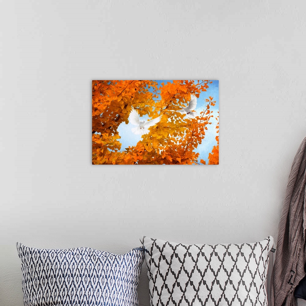 A bohemian room featuring Fine art photograph of two white doves flying in front of a tree with bright orange leaves.