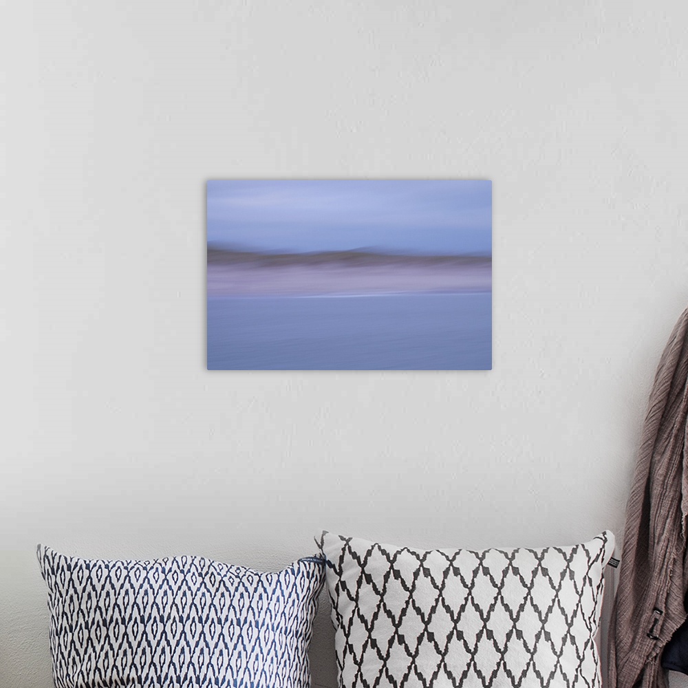 A bohemian room featuring Artistically blurred photo. Sail to the shore on the strong west winds.