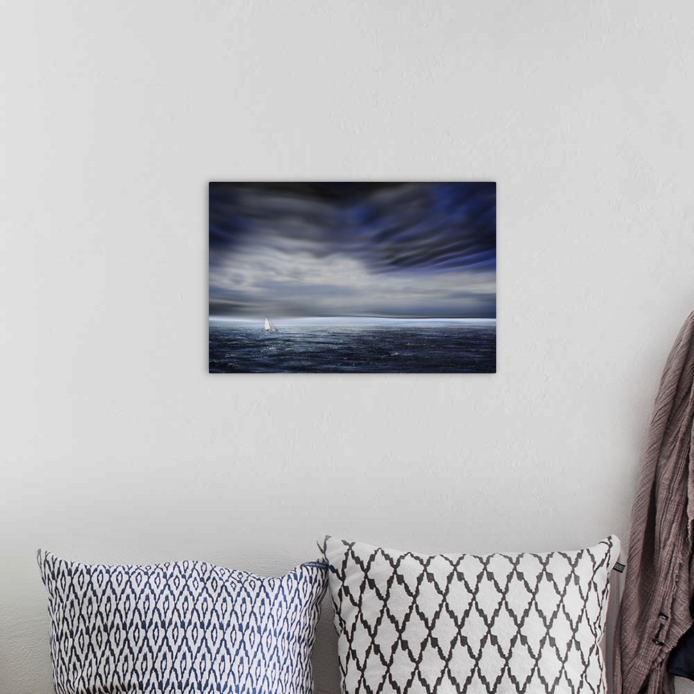 A bohemian room featuring A small sailboat dwarfed by the vastness of the open ocean, under dark stormclouds.