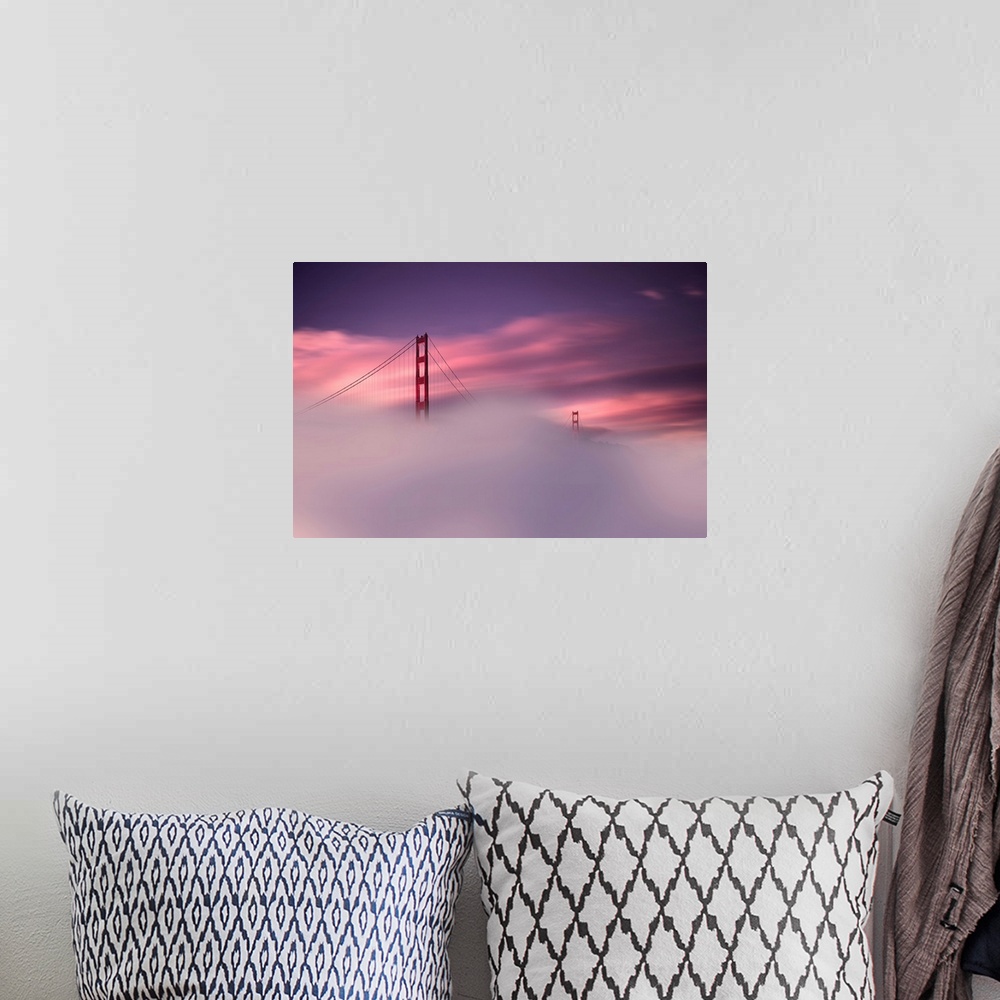 A bohemian room featuring A sunset obscured by dense fog and the Golden Gate Bridge rising out of the mist in this landscap...