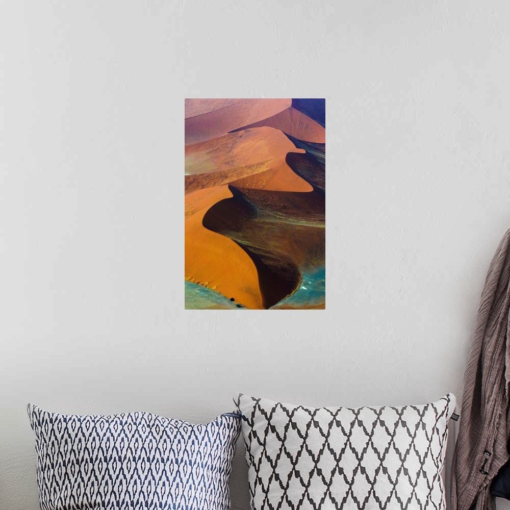 A bohemian room featuring Fine art photo of giant sand dunes of varying colors in Namib-Naukluft National Park, Namibia.
