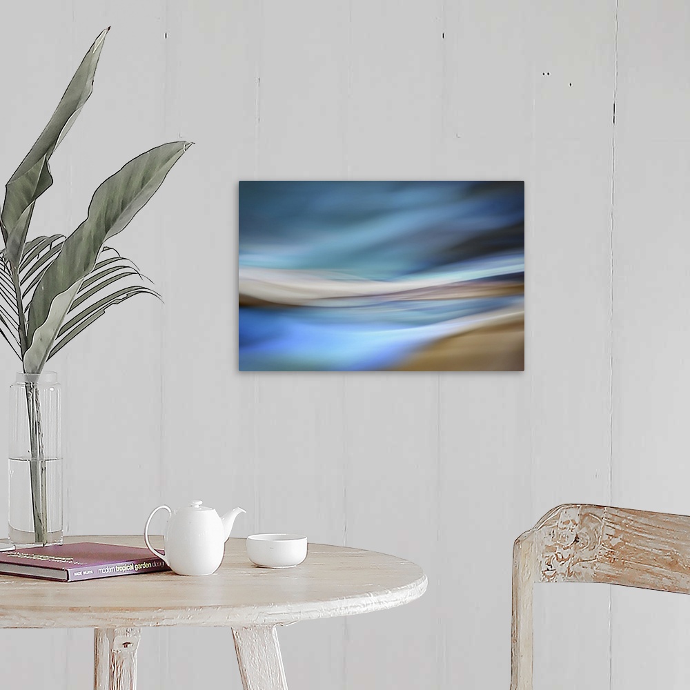 A farmhouse room featuring Abstract interpretation of being on a sandy beach by the ocean, on a blue day.