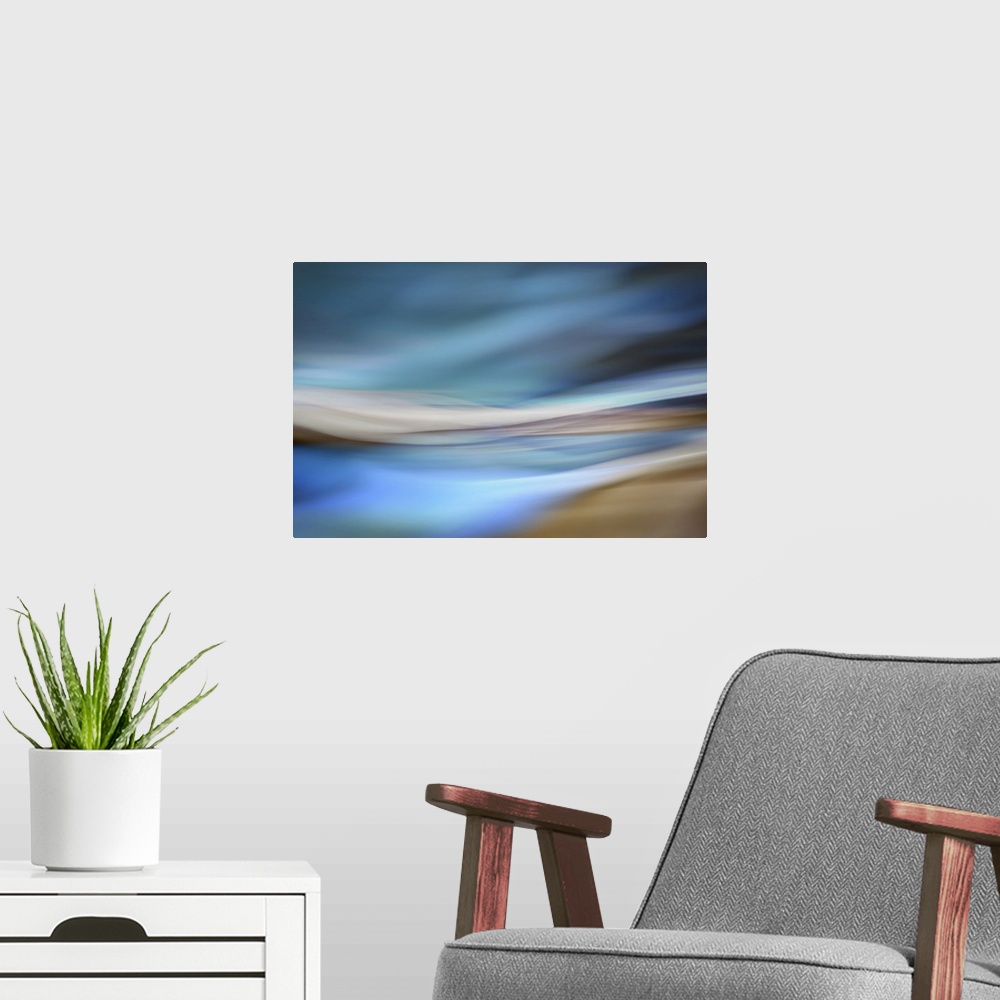 A modern room featuring Abstract interpretation of being on a sandy beach by the ocean, on a blue day.