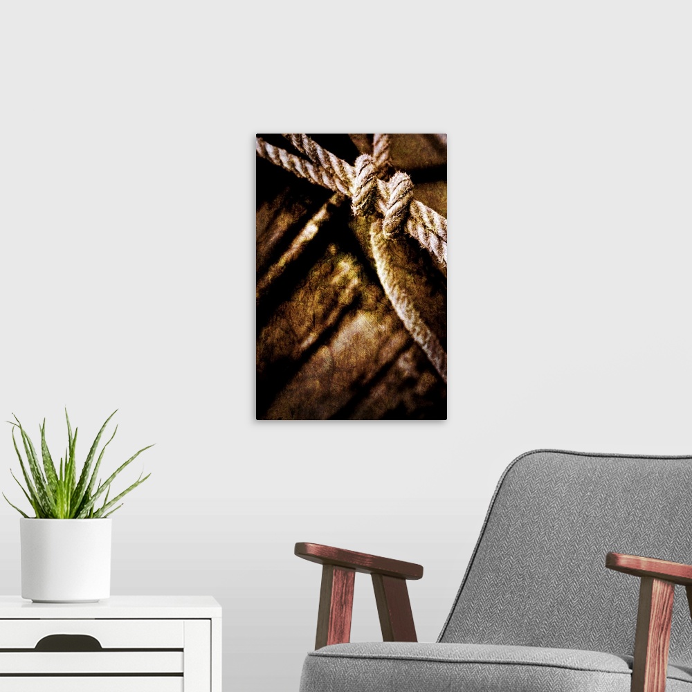 A modern room featuring This fine art photograph of a knot tied and out of focus wood planks in the background. This phot...