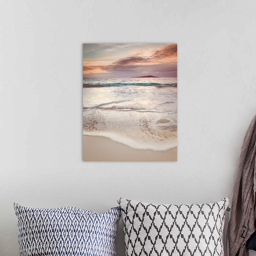 A bohemian room featuring Tide rolling onto the beach.