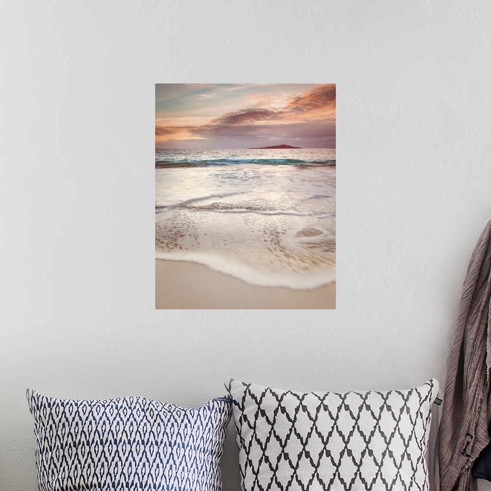 A bohemian room featuring Tide rolling onto the beach.