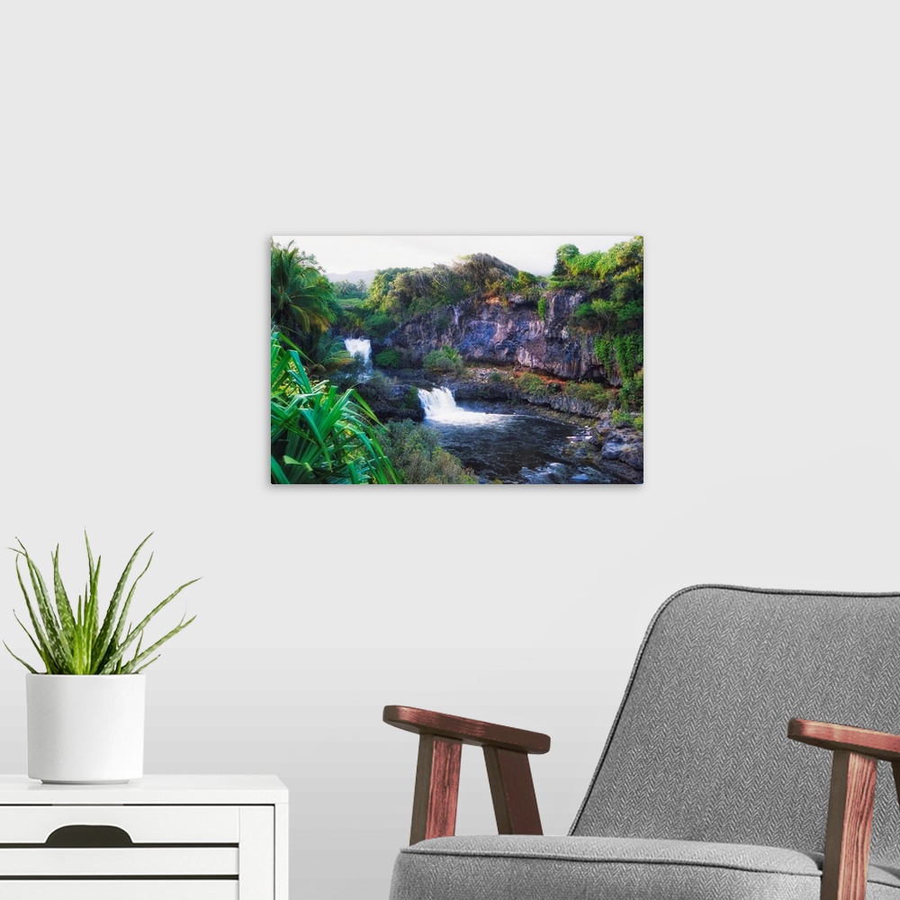 A modern room featuring High angle view of the Waterfalls of the Seven Sacred Pools, Hana Road, Maui, Hawaii.