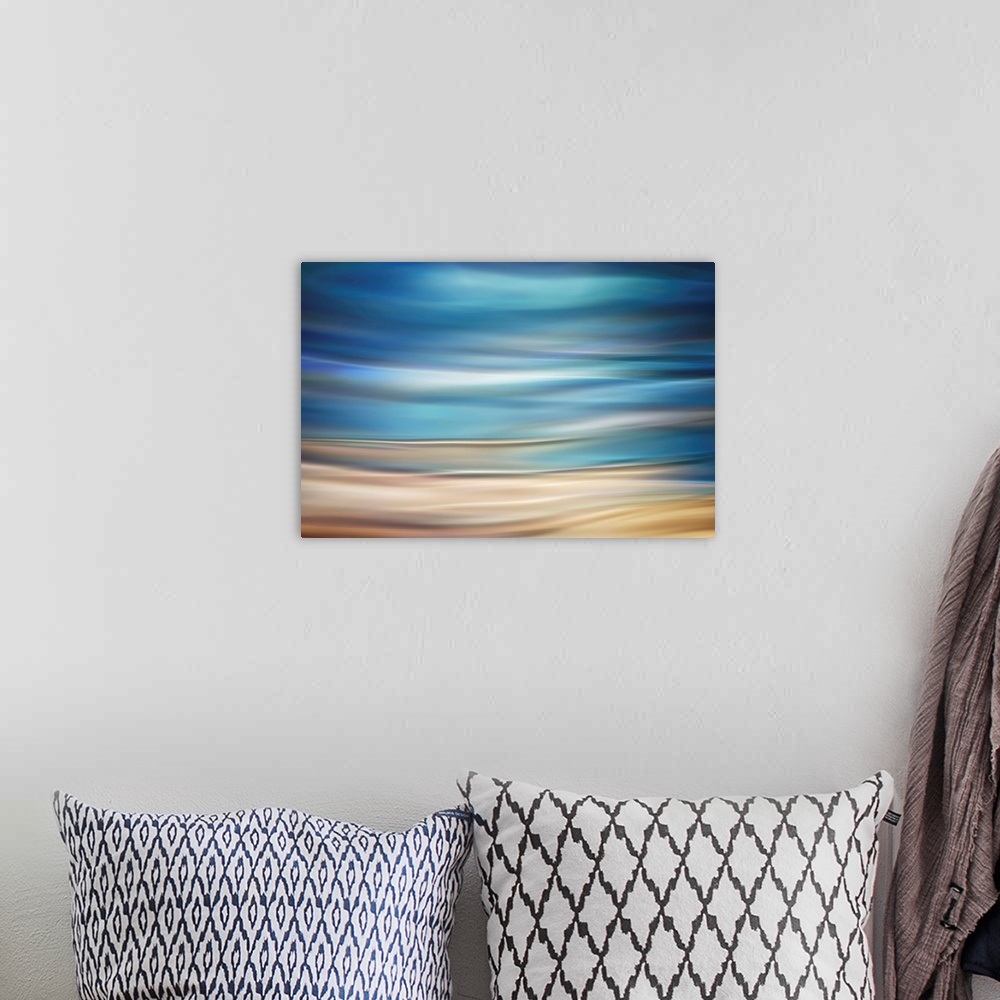 A bohemian room featuring Fine art photograph of abstract waves resembling a coastal landscape.