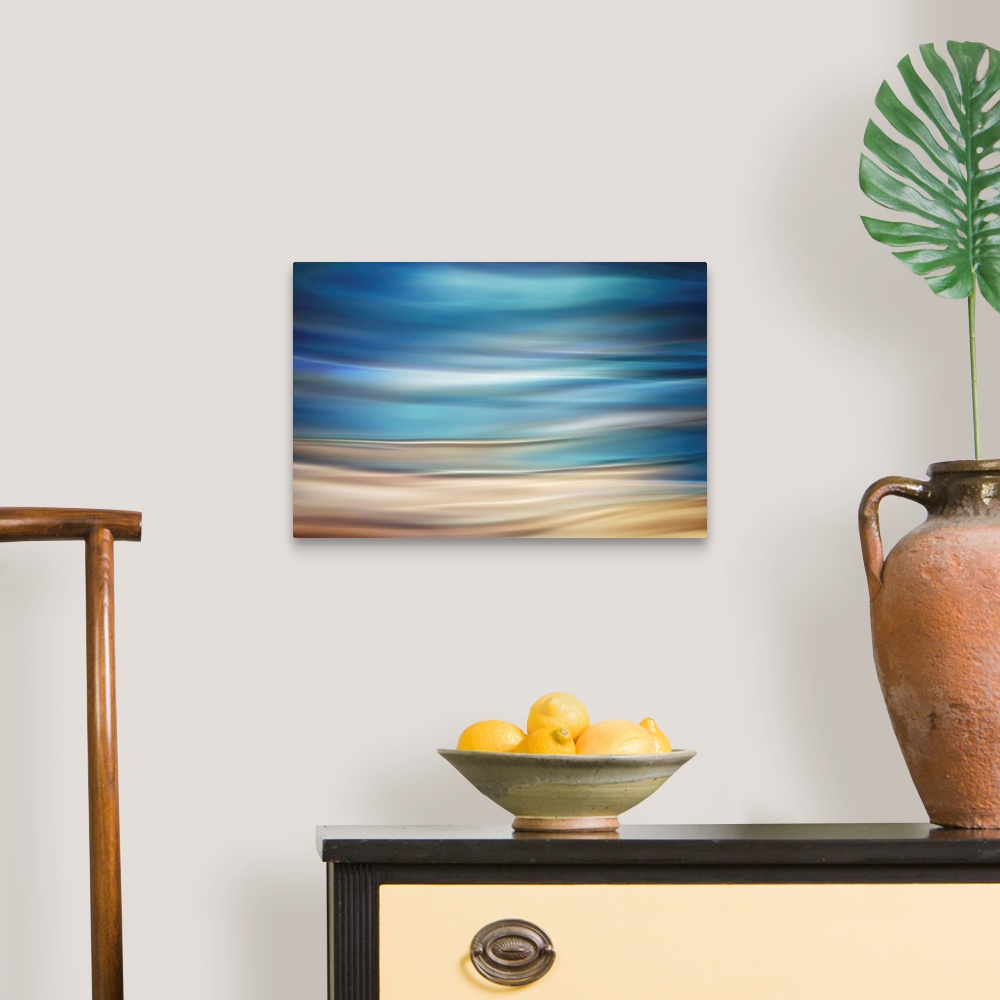 A traditional room featuring Fine art photograph of abstract waves resembling a coastal landscape.