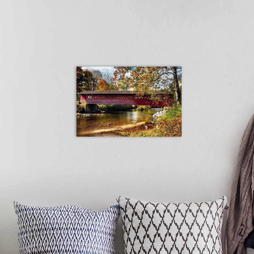 A bohemian room featuring Fine art photo of a historic covered bridge over the Waloomsac River in New England.