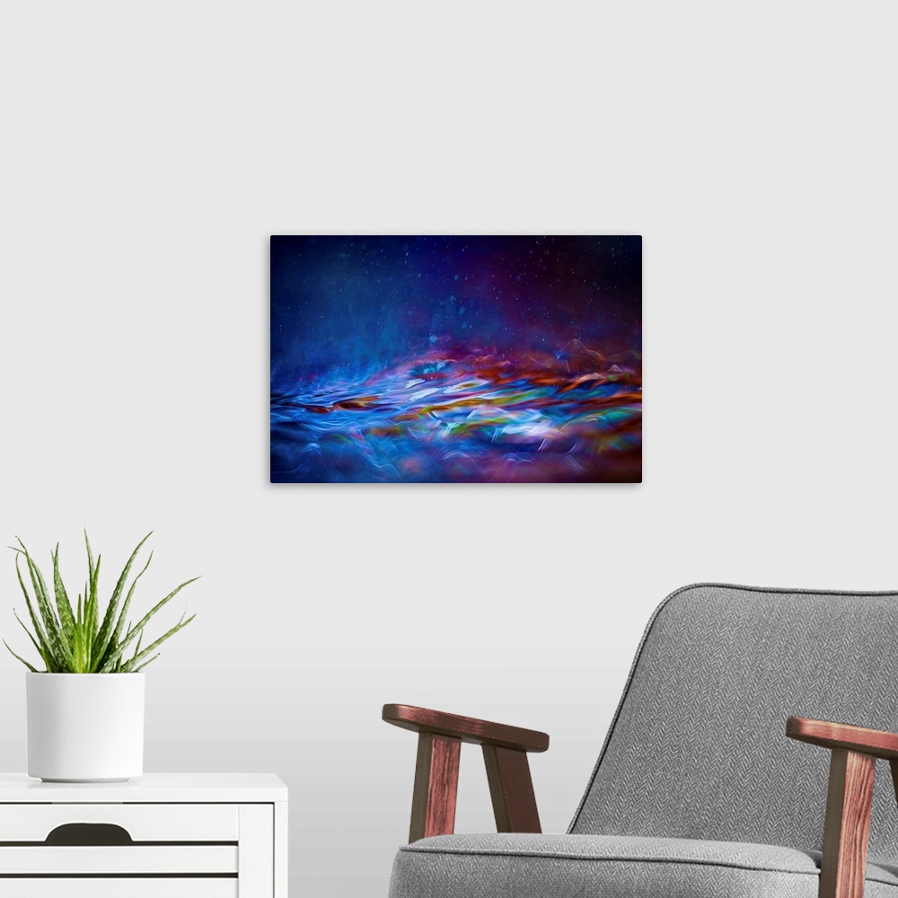 A modern room featuring Contemporary abstract painting of colorful waves and mist of soft glowing light.