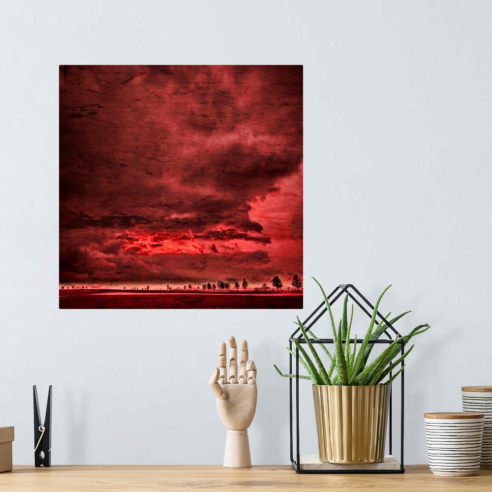 A bohemian room featuring Red sky and large clouds