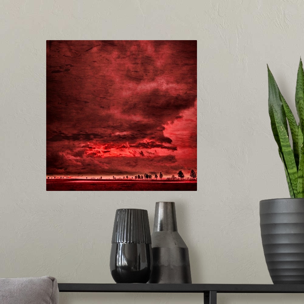 A modern room featuring Red sky and large clouds