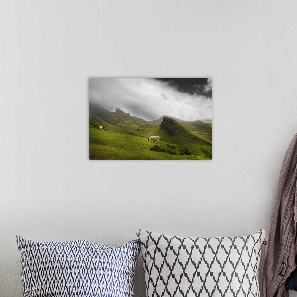 A bohemian room featuring Fine art photo of a misty valley full of large rocky outcroppings with two grazing sheep.