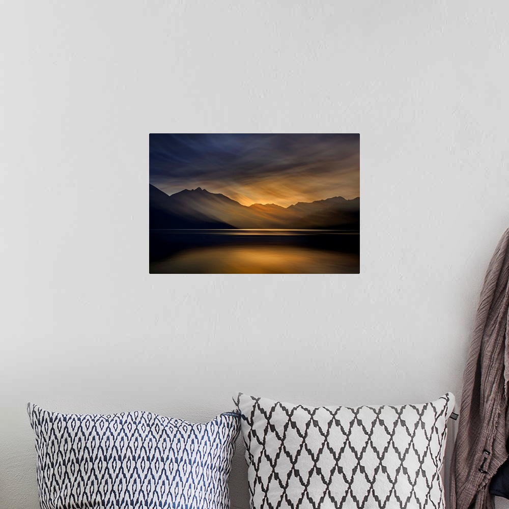 A bohemian room featuring Artistic abstract photograph of a serene lake and mountain scene.