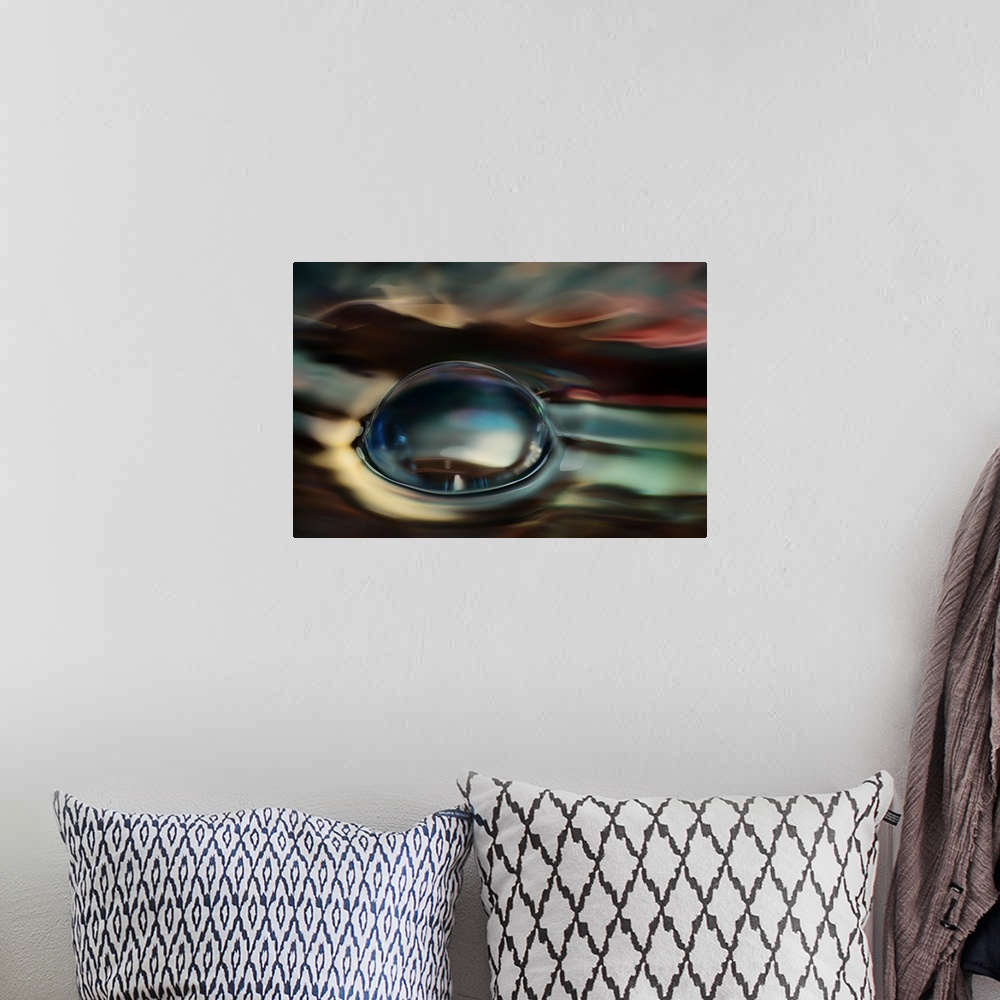 A bohemian room featuring Abstract photograph of blurred and blended colors and flowing lines with a large bubble in the ce...