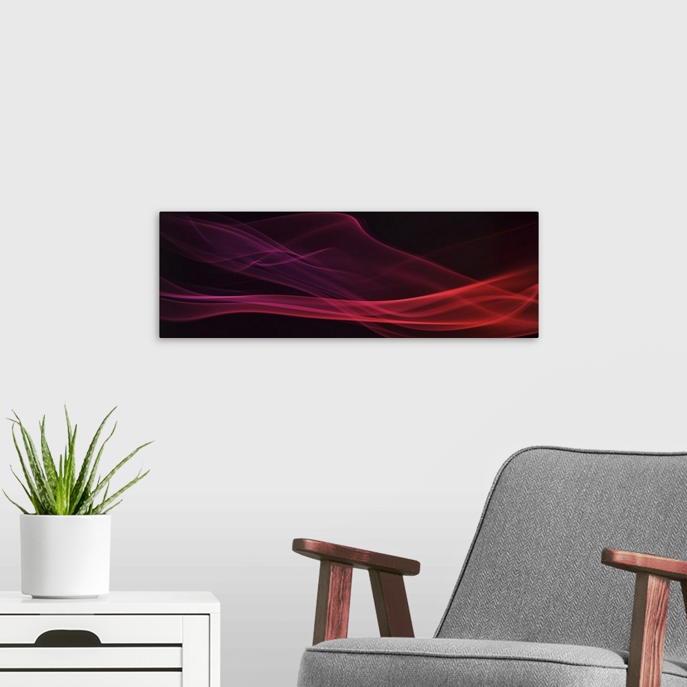 A modern room featuring A photograph of a colorful smoke flowing sinuously against a black background.