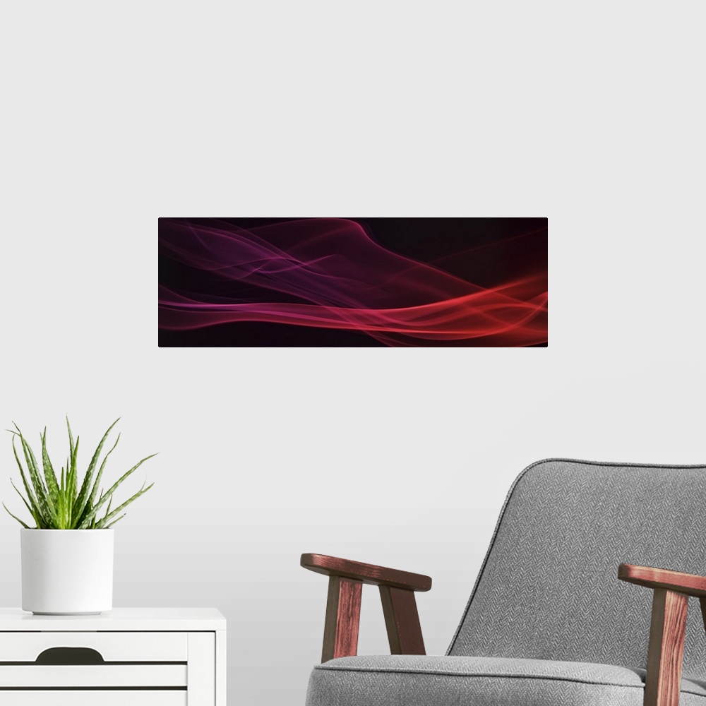 A modern room featuring A photograph of a colorful smoke flowing sinuously against a black background.