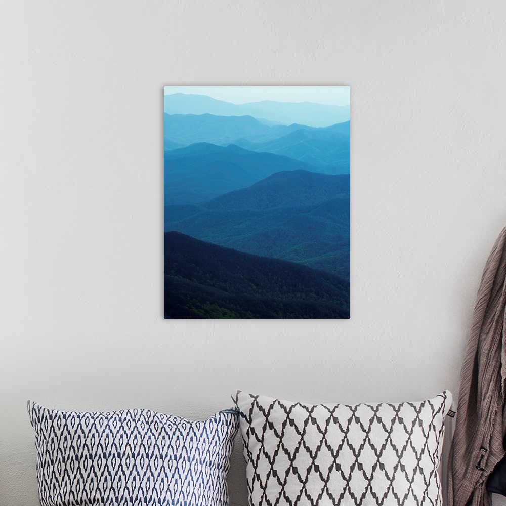 A bohemian room featuring Hazy blue light over the rolling ridges of the Great Smoky Mountains.