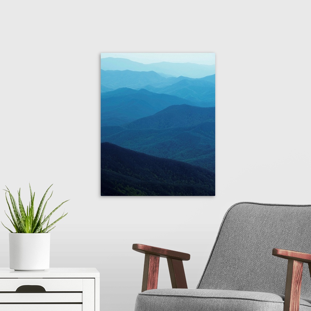 A modern room featuring Hazy blue light over the rolling ridges of the Great Smoky Mountains.