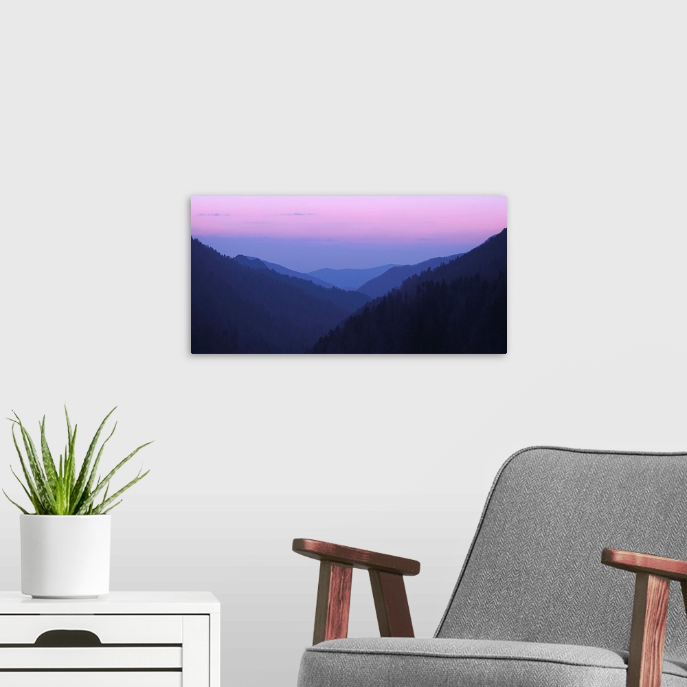 A modern room featuring Lavender sky over the Blue Ridge Mountains at sunset.