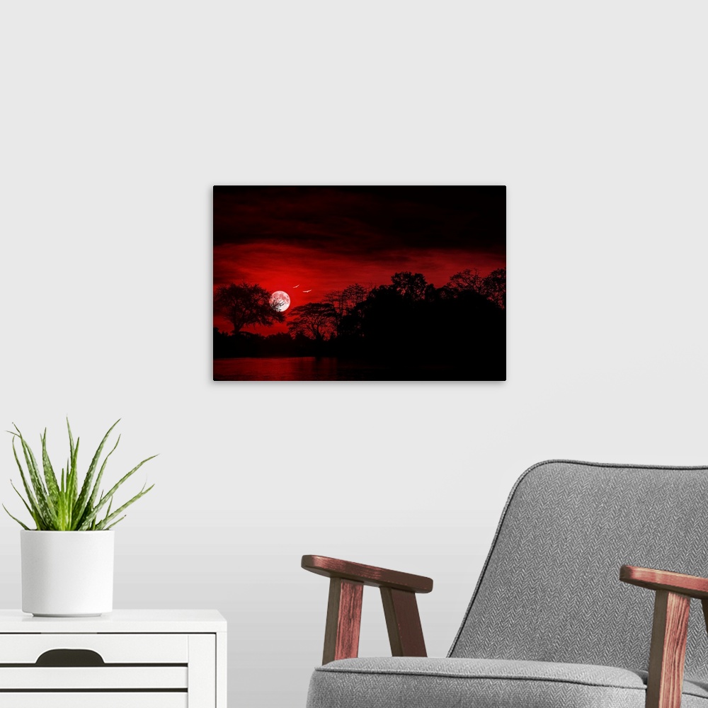 A modern room featuring Sunset with a moon and birds, shot with a red filter