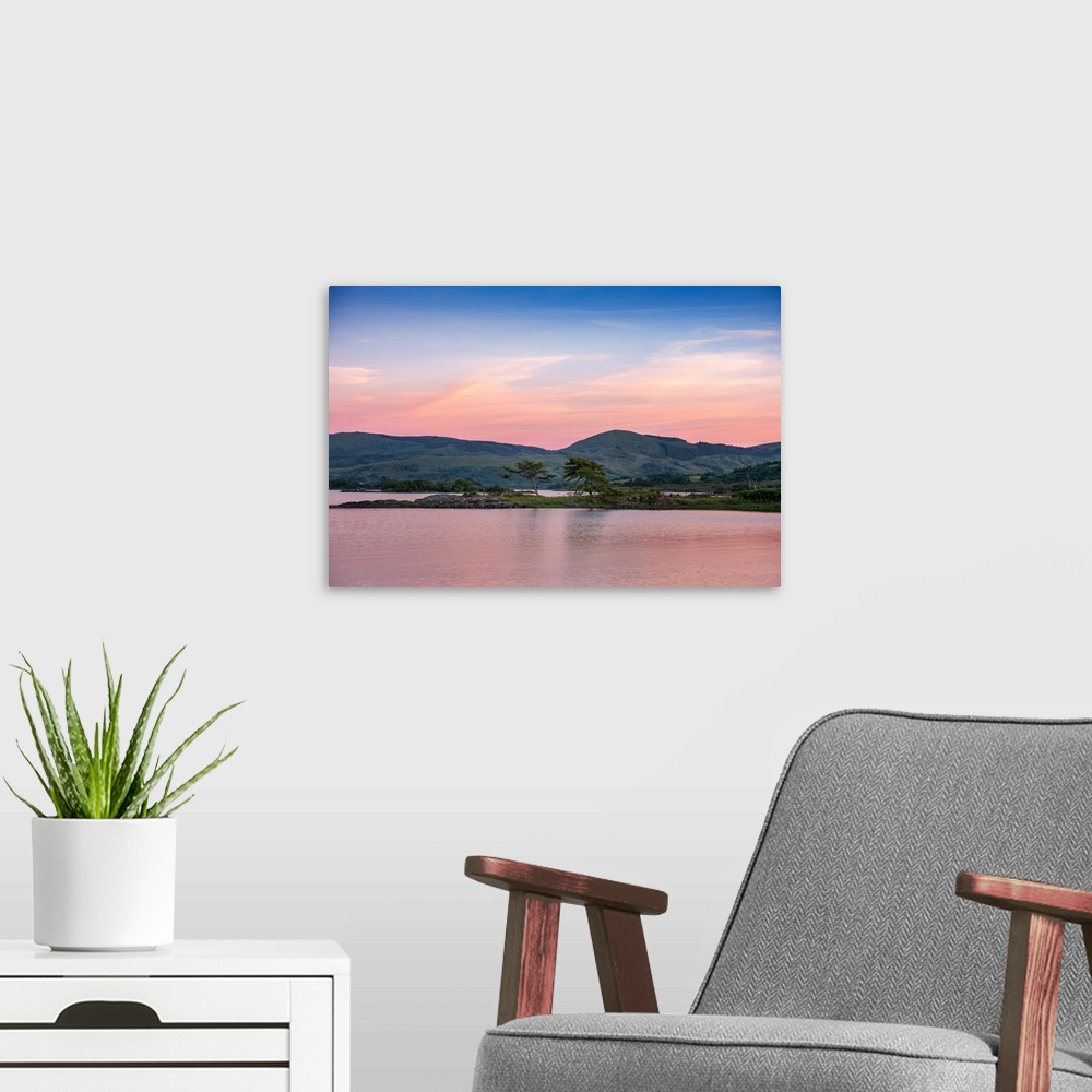 A modern room featuring Peaceful landscape at dawn