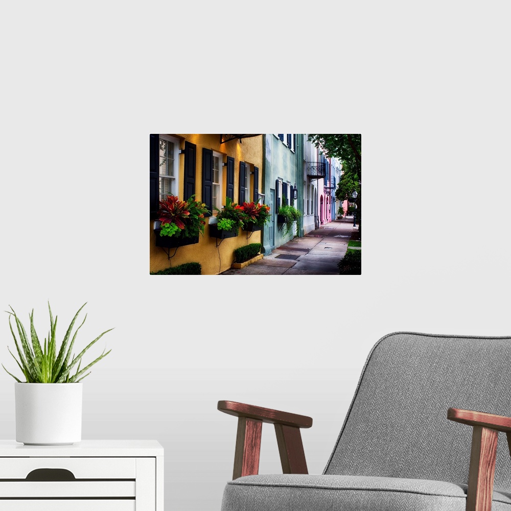 A modern room featuring Fine art photo of a shaded alley with colorful buildings in Charles, South Carolina.