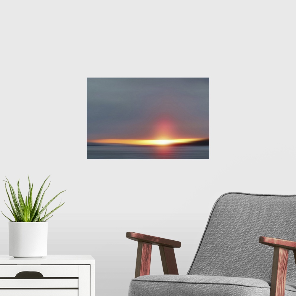 A modern room featuring Spring sunset above the lake Limfjord.
