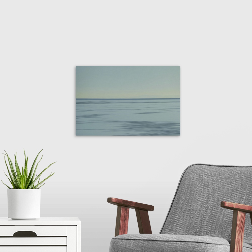 A modern room featuring Spring sunset above the lake Limfjord.