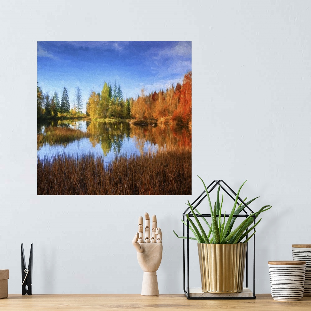 A bohemian room featuring A peaceful pond in the middle of a forest in fall colors under a deep blue sky.