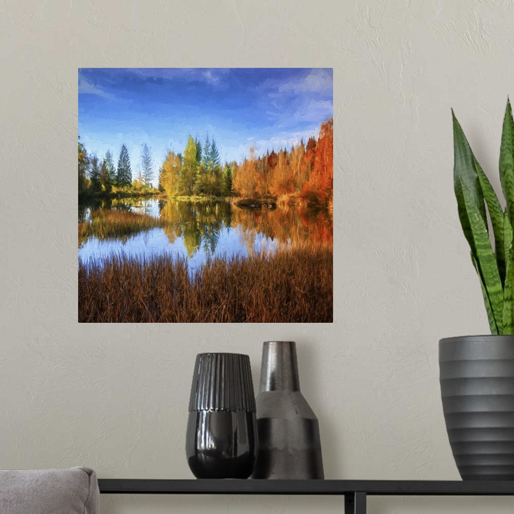 A modern room featuring A peaceful pond in the middle of a forest in fall colors under a deep blue sky.