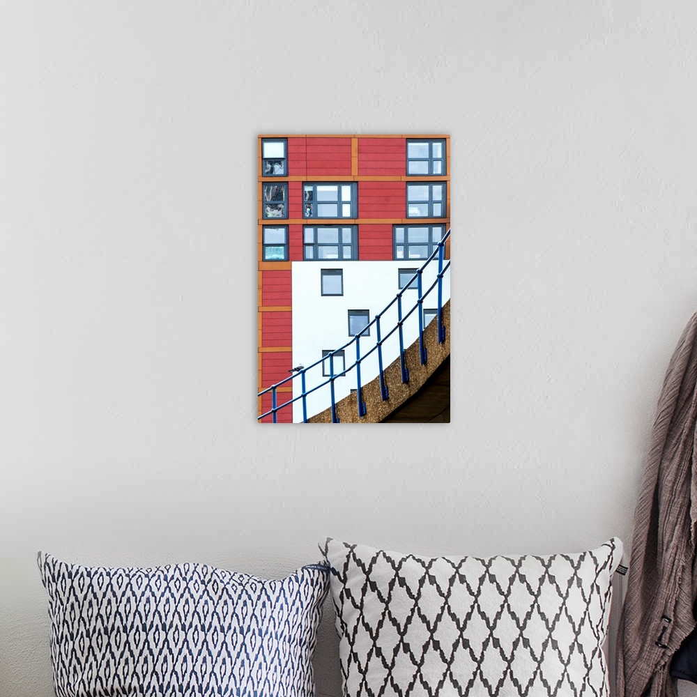 A bohemian room featuring A photograph of architectural details in a city.