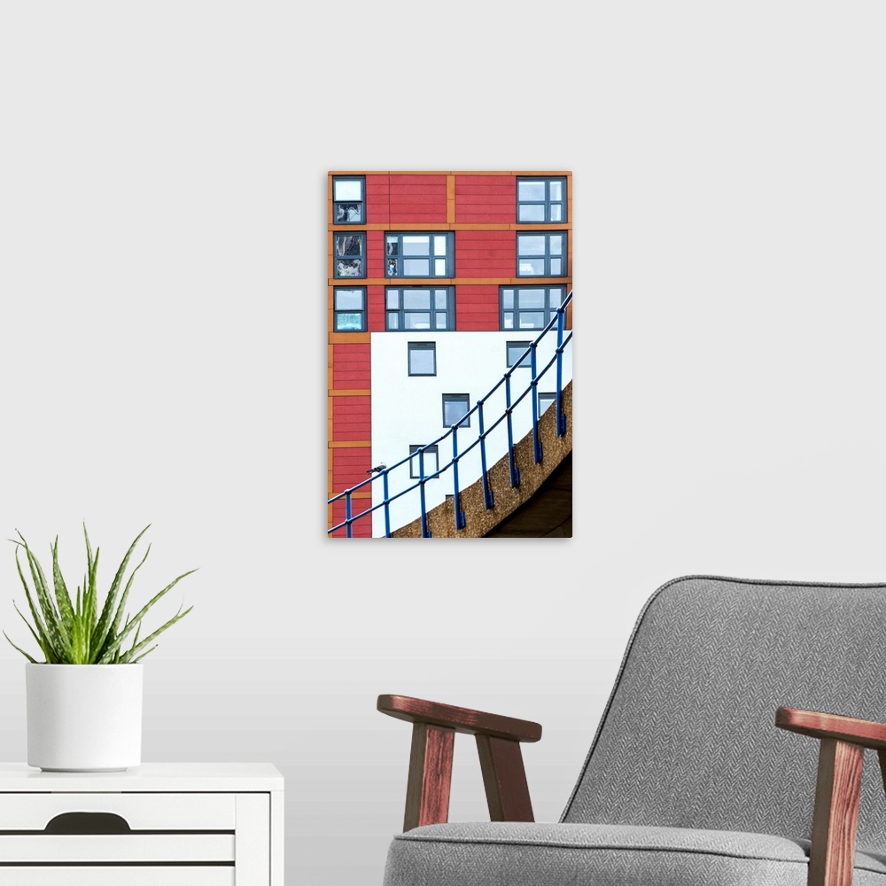 A modern room featuring A photograph of architectural details in a city.