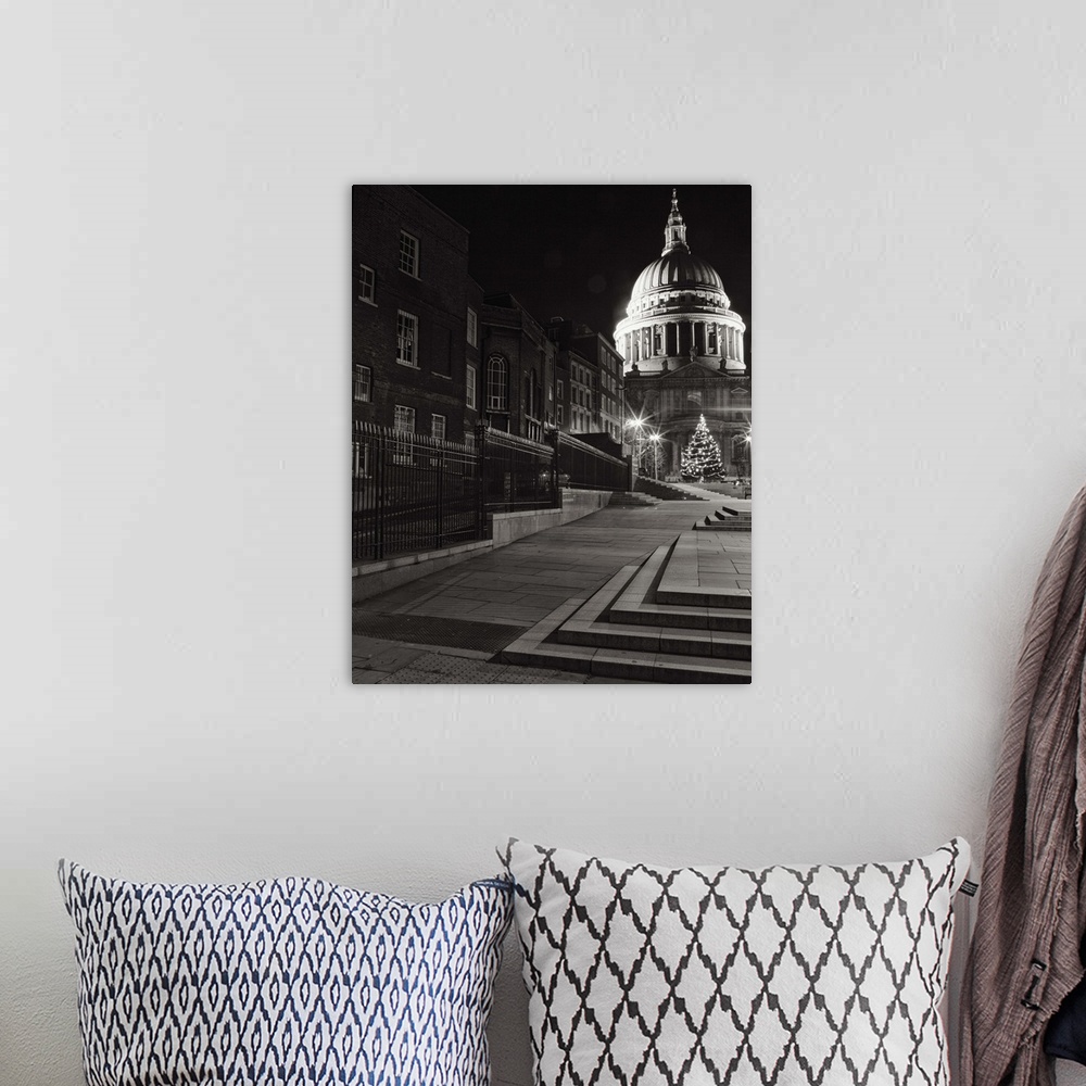 A bohemian room featuring A monochrome black and white night image of St. Pauls, London, England.