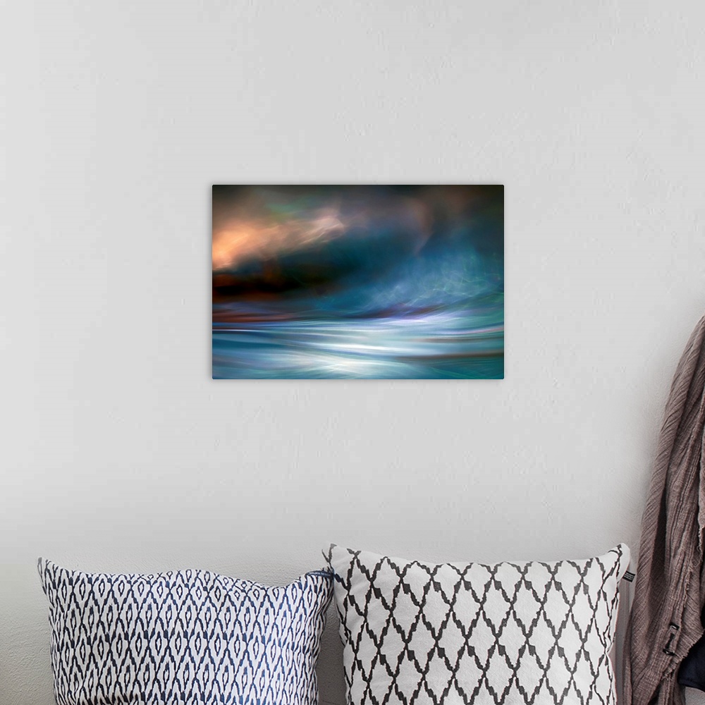 A bohemian room featuring Contemporary abstract photograph of blowing winds and clouds with light breaking through.