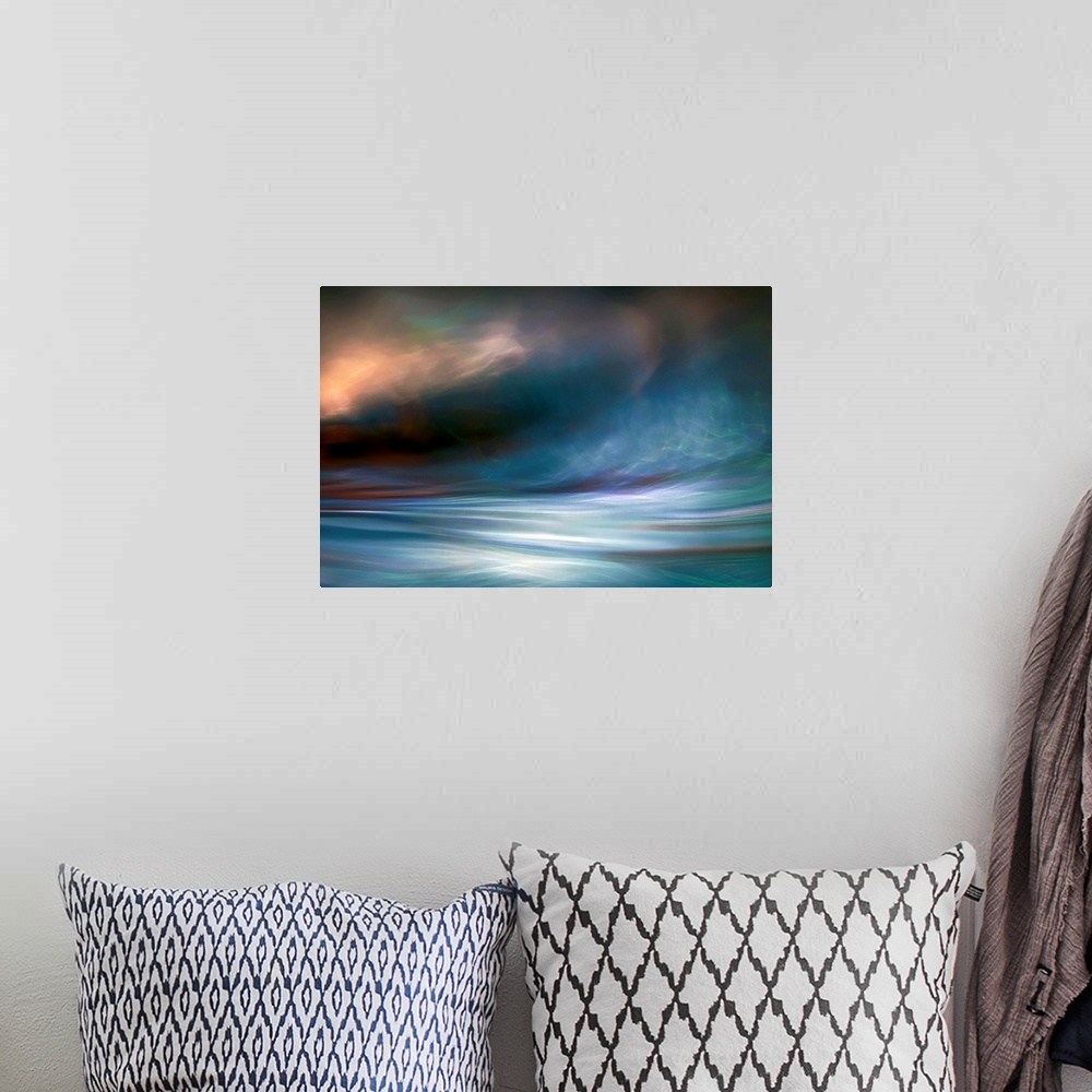 A bohemian room featuring Contemporary abstract photograph of blowing winds and clouds with light breaking through.