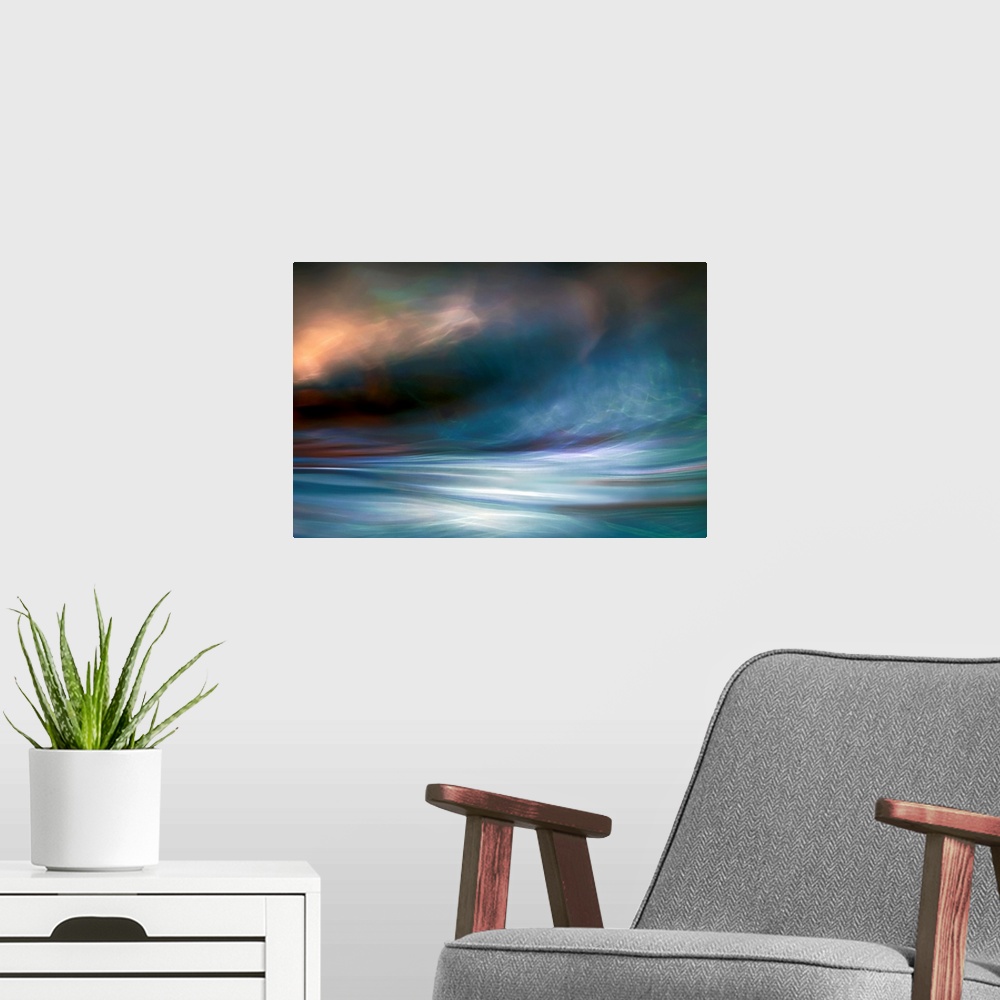 A modern room featuring Contemporary abstract photograph of blowing winds and clouds with light breaking through.