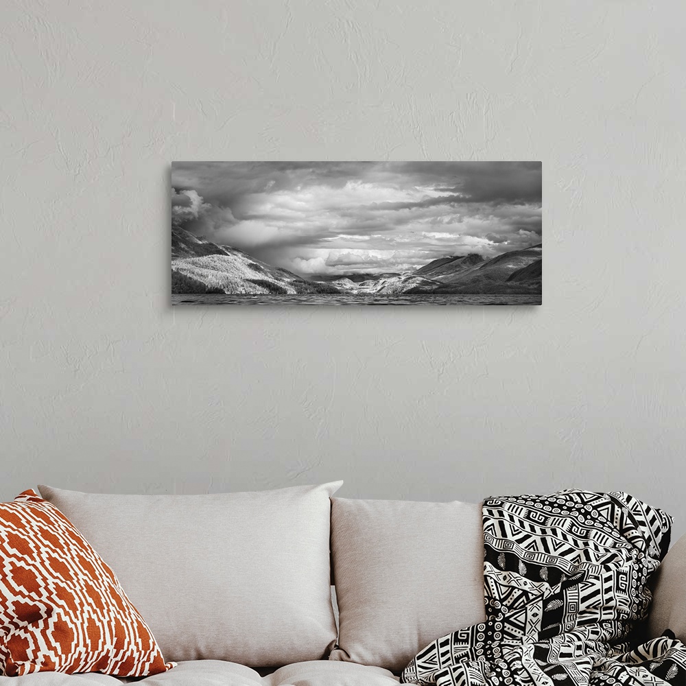 A bohemian room featuring Storm Over Inlet
