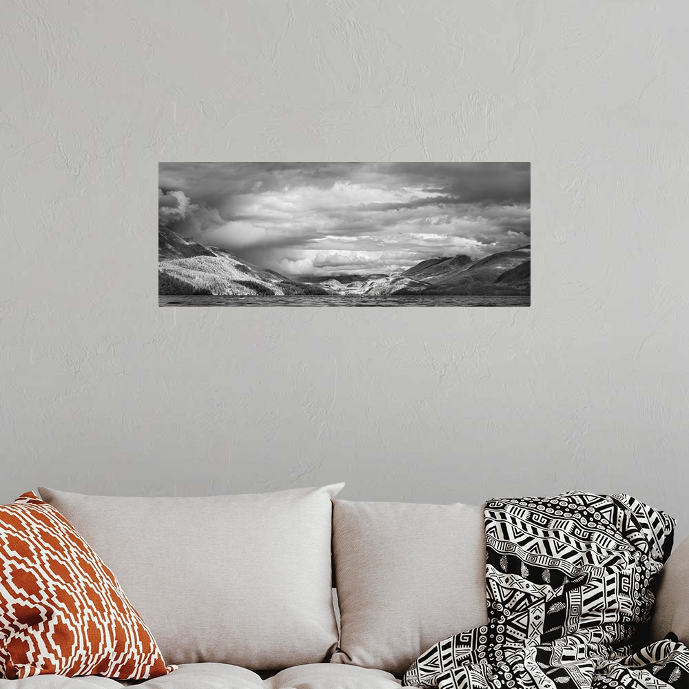 A bohemian room featuring Storm Over Inlet