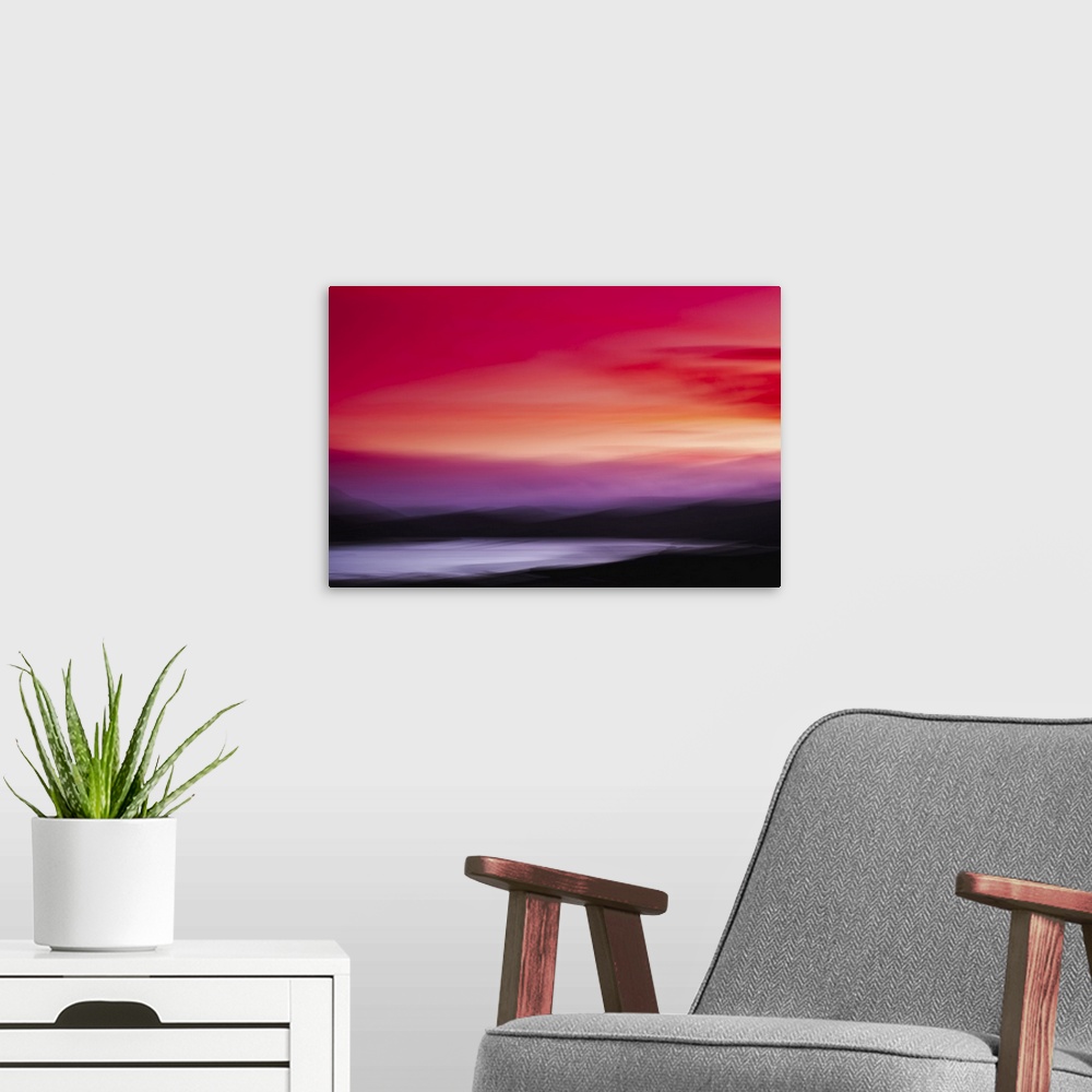A modern room featuring Abstract landscape sunset with red and pink skies over black mountains and a lake.